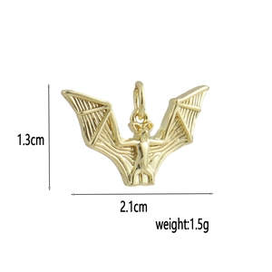 Detailed 18k gold plated bat pendant with 1.3cm height and 2.1cm width measurements
