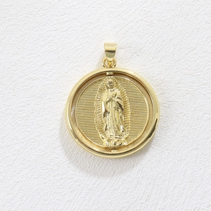 Detailed close-up of a rotating 18k gold-plated Virgin Mary pendant with intricate engraving