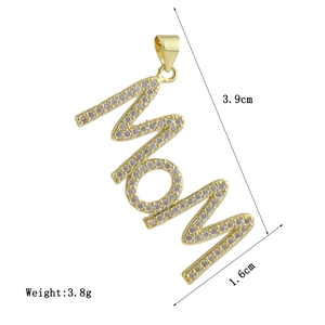 Detailed view of a gold-plated MOM letter pendant with inlaid white zircon stones