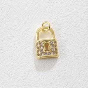 Detailed view of 18k gold plated lock pendant with micro-pave zircons for DIY jewelry