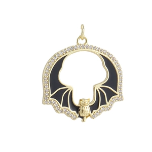 Macro detail of bat pendant with black enamel wings and sparkling zircon stone inlay