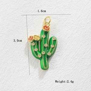 Detail of green enamel cactus charm with white crystals and gold plating, 3.0cm height