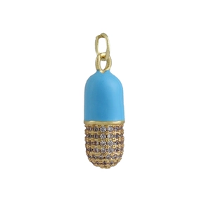 Macro detail of blue enamel capsule pendant with pave zircon accents in 18k gold plating
