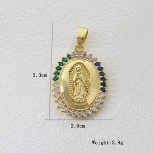 Close-up of 18k gold-plated Virgin Mary oval pendant with multi-colored zircon stones