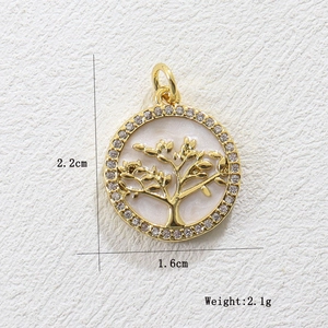 Detailed view of Tree of Life gold pendant with crystal rim measuring 2.2cm x 1.6cm