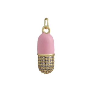 Macro shot of 18k gold capsule pendant featuring pink enamel and white zircon inlay