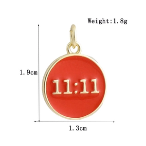 Detail of 18k gold plated round heart pendant with red enamel and 11:11 engraving