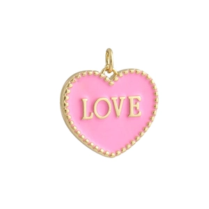 Detail of a pink heart pendant with LOVE engraving and gold beaded frame for jewelry
