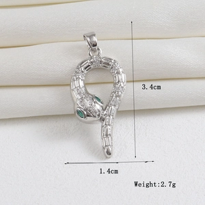 Silver snake pendant with crystal pavé and green gem eyes, 3.4cm tall weighing 2.7g