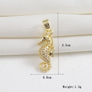 Detailed view of an 18k gold-plated seahorse pendant with clear crystals and dimensions