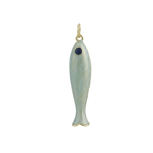 Detail view of a fish pendant with mint green enamel and a blue gem eye in gold finish