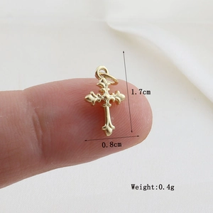 Detailed view of 1.7x0.8cm golden cross pendant with dimensions and weight info