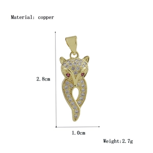 Close-up of gold fox pendant with white cubic zirconia and detailed size measurements