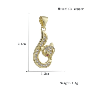 Detail view of fox pendant with zircon inlay and red gem eye, 2.6cm copper jewelry