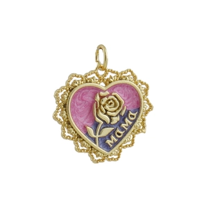 Detail of a vintage gold heart pendant with purple enamel and a rose 'Mama' engraving