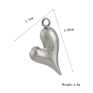 Polished silver heart pendant details showing 3.25cm height and 1.7cm width dimensions