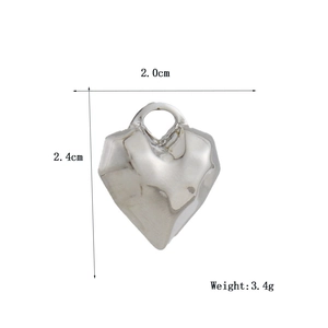 Detailed view of silver 3D heart pendant with geometric facets and size dimensions