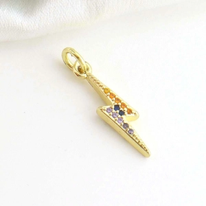 Detail of 18k gold plated lightning bolt pendant with colorful zircon stones inlay