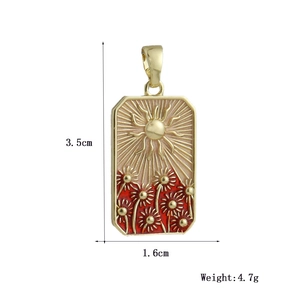 Detail view of a sun and floral tarot pendant showing 3.5cm x 1.6cm dimensions and weight