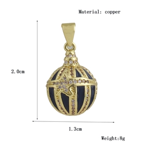 Detailed view of an Easter egg copper pendant with blue enamel and star crystals