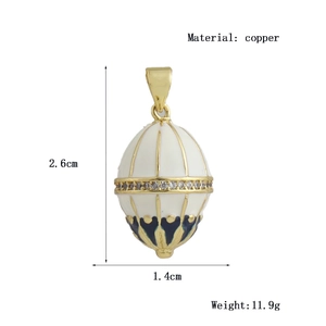 Vintage copper egg pendant with white enamel inlay and sparkling zircon stones