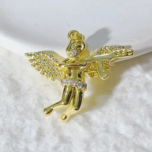 Golden hip-hop angel pendant holding a rifle with sparkling white zircon wings