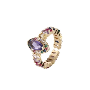 Bohemian adjustable gold ring with purple marquise stone and multi-color crystals
