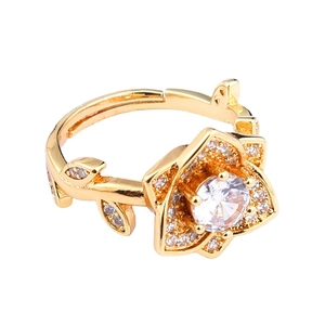 Adjustable gold plated copper ring with flower design and sparkling zircon stone