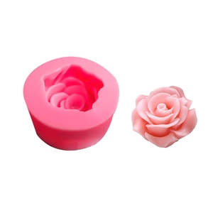 Close-up of 3D rose silicone mold with a finished pink resin flower detail