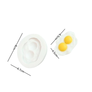 Detailed size view of poached egg silicone mold with yellow double yolk finish