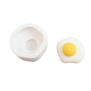 Poached egg silicone mold for DIY candles and soaps with a cute smiling face design