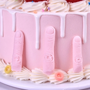Funny Halloween severed finger silicone mold pink cake decoration with white cream drips
