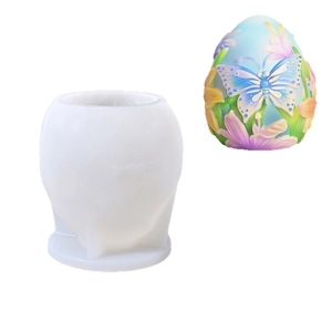Easter egg silicone mold with detailed butterfly and floral patterns for DIY candles