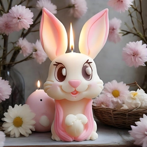 Detailed view of rabbit shaped candle with pink ears for Easter home decoration