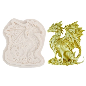 Maple leaf dragon silicone mold with finished resin sculpture on white background