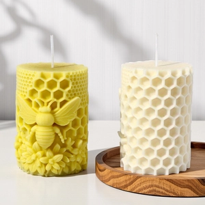 Honeycomb and bee scented candle set with floral relief on wooden tray for decor