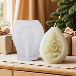 Hollow Christmas tree silicone mold for DIY candles with floral art on wood table
