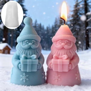 DIY Santa Claus silicone candle mold with finished blue and pink festive candles