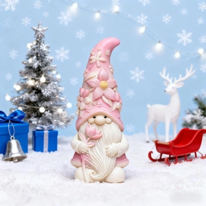 Detail of pink floral gnome figurine with embossed patterns in a winter scene