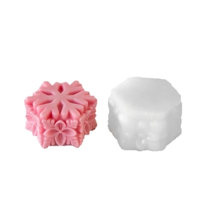 Snowflake silicone mold for Christmas chocolate and aromatic candle making in pink