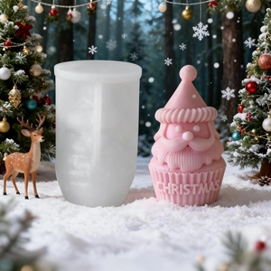 Christmas gnome candle silicone mold set with finished pink Santa cupcake and snow background