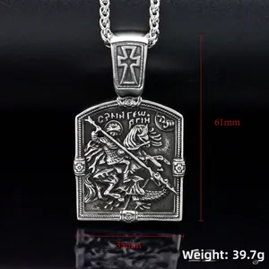 Macro shot of stainless steel Knight pendant showing dimensions 61mm by 35mm