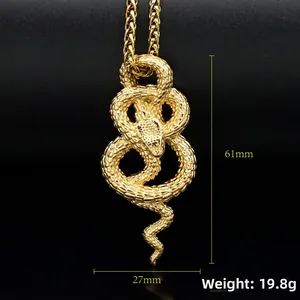 Detail view of 18k gold snake pendant with size measurements 61x27mm and 19.8g weight