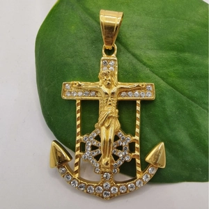 Gold-plated anchor cross pendant with Jesus figure and sparkling crystals on leaf