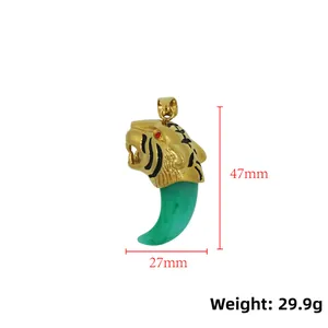 Detail view of tiger head pendant with resin claw, size 47x27mm and weight 29.9g