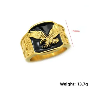 Macro detail of men's eagle ring showing 16mm width and textured gold-tone side band