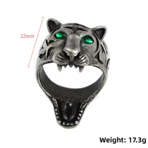 Vintage stainless steel tiger head ring with green gemstone eyes and antique silver finish