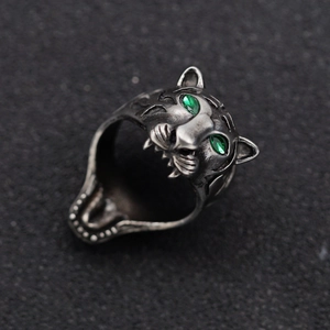 Vintage stainless steel tiger head ring with green gemstone eyes in aged silver finish