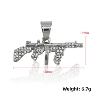 Macro detail of silver iced out MK48 gun pendant with 42mm length and 6.7g weight