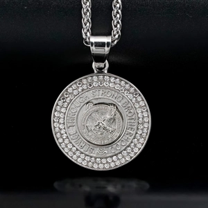 Macro detail of Fraternal Order of Eagles Philippine pendant with crystal border